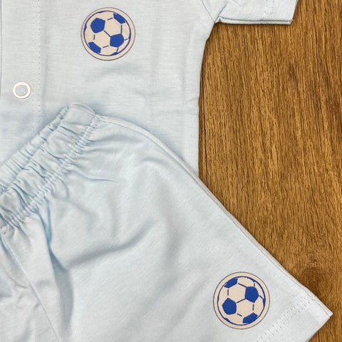 The item in the image is an (Magic train)Unisex Cotton Plain Baby Short Sleeves Suit & Short Pants. The small logo on both the shirt and shorts is a foot ball.